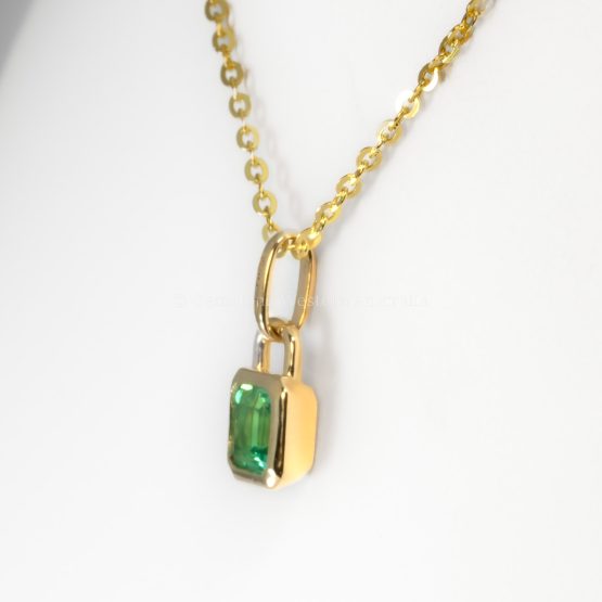 side view of 0.33ct Vivid Green Colombian Emerald Pendant in 18K Yellow Gold