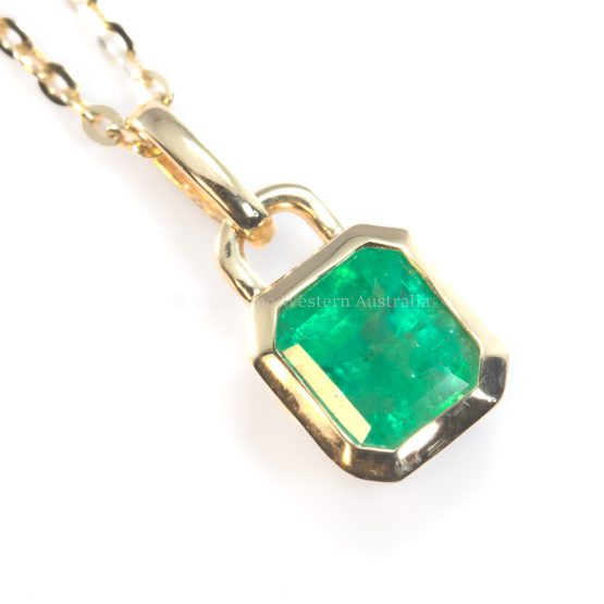 bird's eye view of 0.41ct Colombian Emerald Pendant in Emerald Cut | 18K Yellow Gold