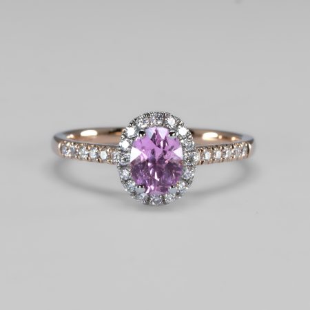 front view of 1.08ct Oval Pink Sapphire Halo Ring in Platinum and 18K Rose Gold