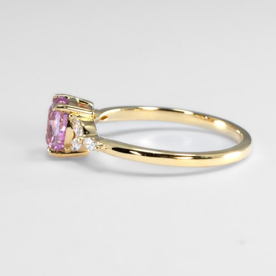 side view of Unheated 1.34ct Baby Pink Sapphire Ring with Marquise Diamond Accents in 18K Yellow Gold