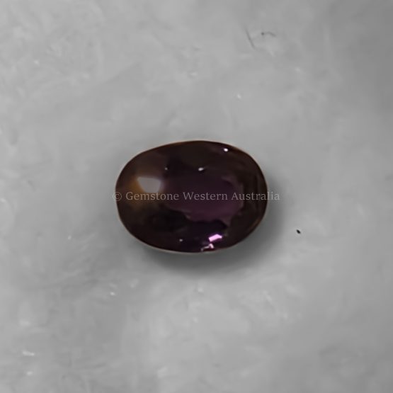 FRONT VIEW OF 0.75 CT NATURAL ALEXANDRITE - OVAL CUT WARM LIGHT
