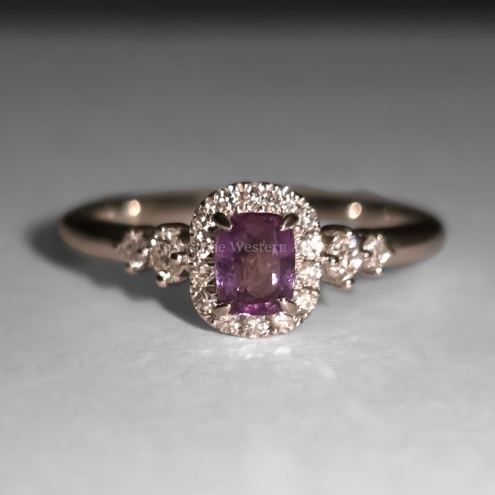 warm light view of Platinum Alexandrite Ring with Diamond Halo and Side Accents
