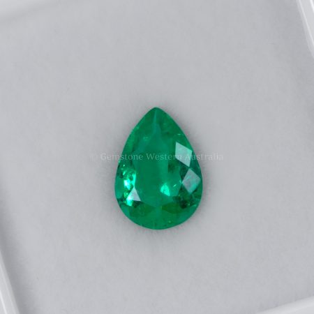 FRONT VIEW OF 0.79 CT NATURAL COLOMBIAN EMERALD - PEAR CUT