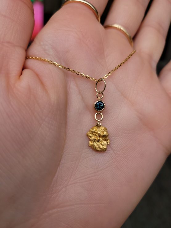 view on hand of Natural Gold Nugget Pendant with Green Australian Sapphire in 18K Yellow Gold - 1982850