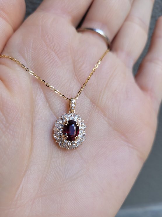 photo on hand of Unheated ruby pendant and Diamond Cluster Pendant in 18K Yellow Gold - 1982860