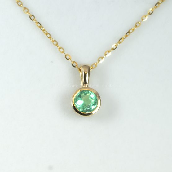 front view of bezel set emerald pendant - 1982863