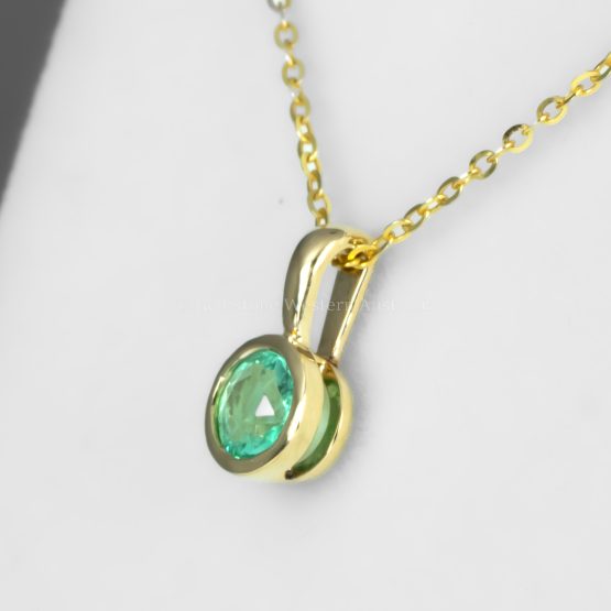 side view of bezel set emerald pendant - 1982863