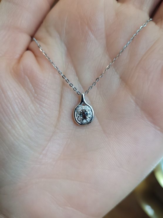photo on hand of Alexandrite and diamond pendant - 1982868