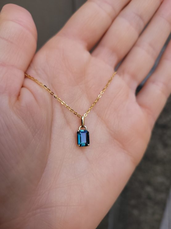 view on hand of Teal Sapphire Gold Pendant in 18K Yellow Gold - 1.53ct Unheated Sapphire - 1982875