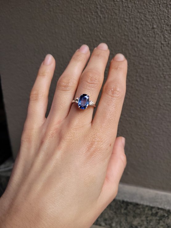 view on hand of Blue Sapphire Three-Stone Ring in 18K White Gold with 2.38ct Oval Sapphire and Diamonds - 1982881