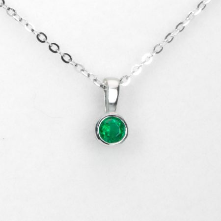 front view of Round Emerald Solitaire Pendant in Platinum with Vivid Green 0.18ct Stone - 1982874