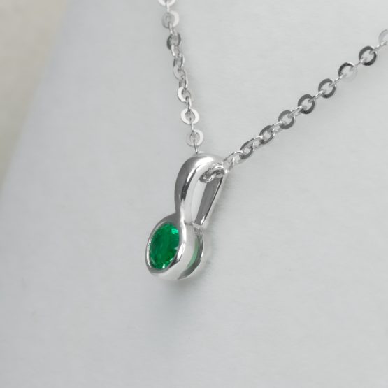 side view of Round Emerald Solitaire Pendant in Platinum with Vivid Green 0.18ct Stone - 1982874