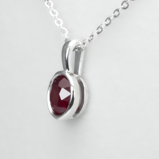 side view of Ruby Platinum Pendant with Oval Cut Unheated Ruby in Bezel Setting - 1982877